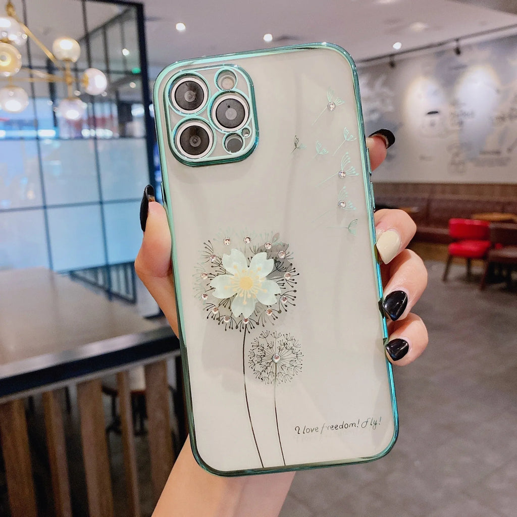 Green iPhone case with 3D floral design and extended kickstand on a table
