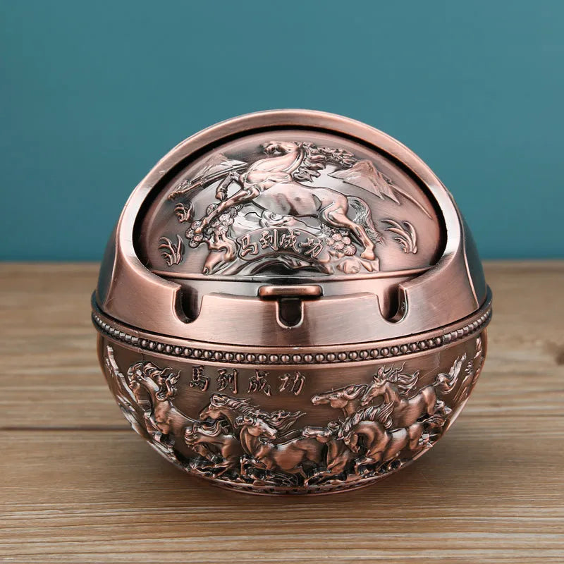 Bronze alloy ashtray with decorative fortune tree design and smoke extinguishing slot.