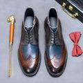 Men's vintage brogue ankle boots in curry blue cowhide leather with colour-blocking and low square heel.