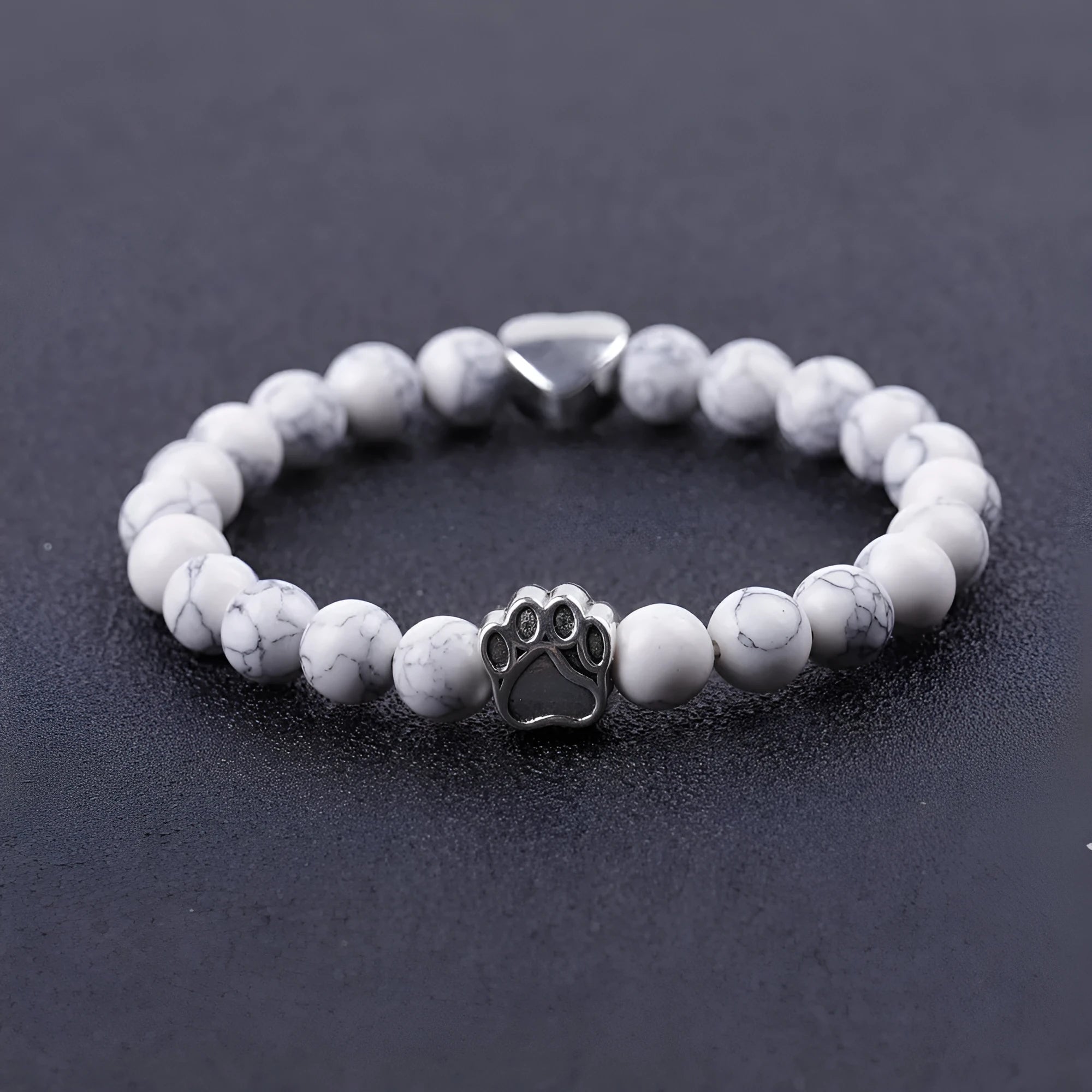 Tigereye Indian Agate stone bracelet shaped like a dog's paw with an engraved love heart.