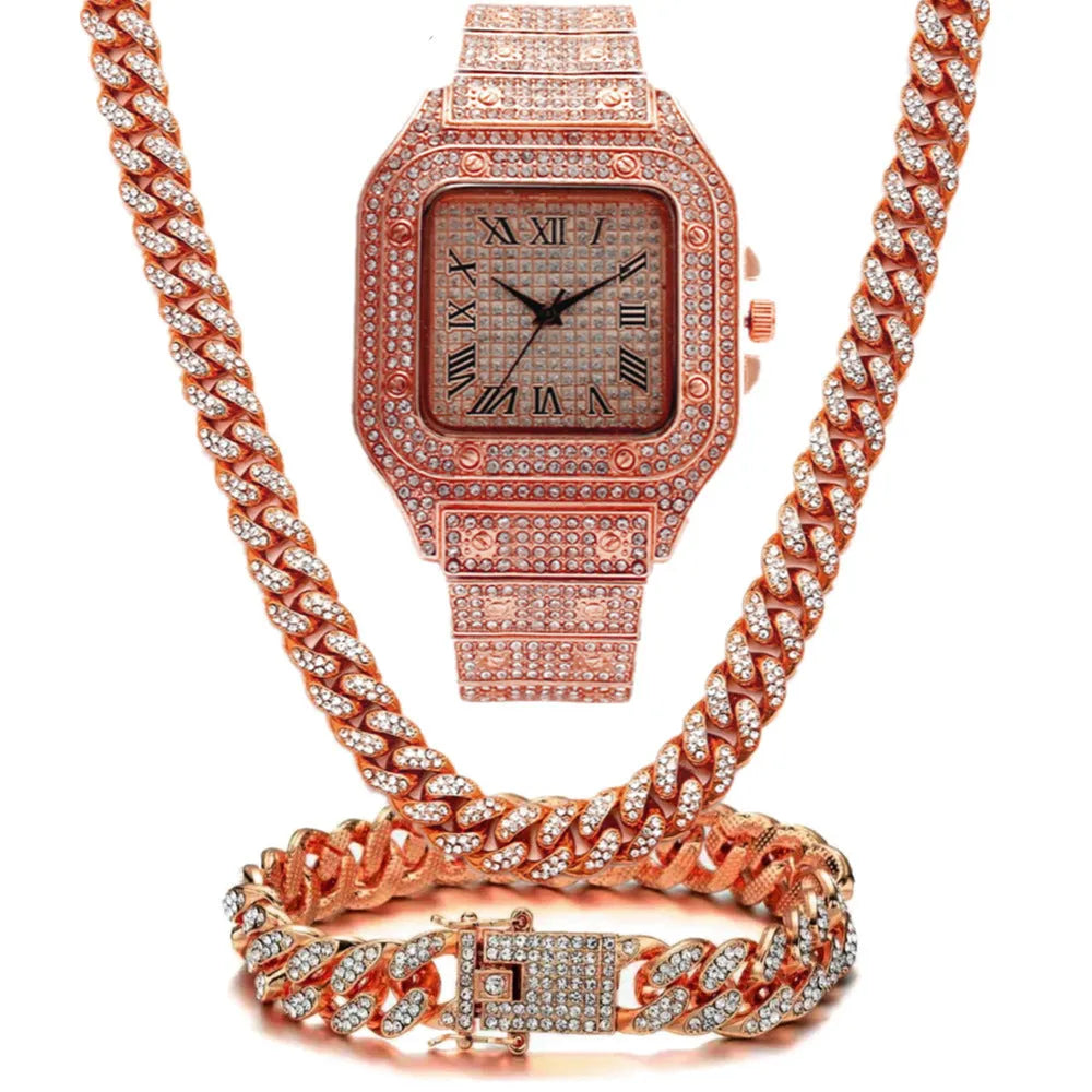 Square Roman numeral quartz watch with diamond studs on black mesh band, with matching bracelet and necklace.