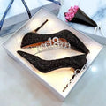 Silver and black women's stiletto wedding shoes with crystal detail on PU leather upper.