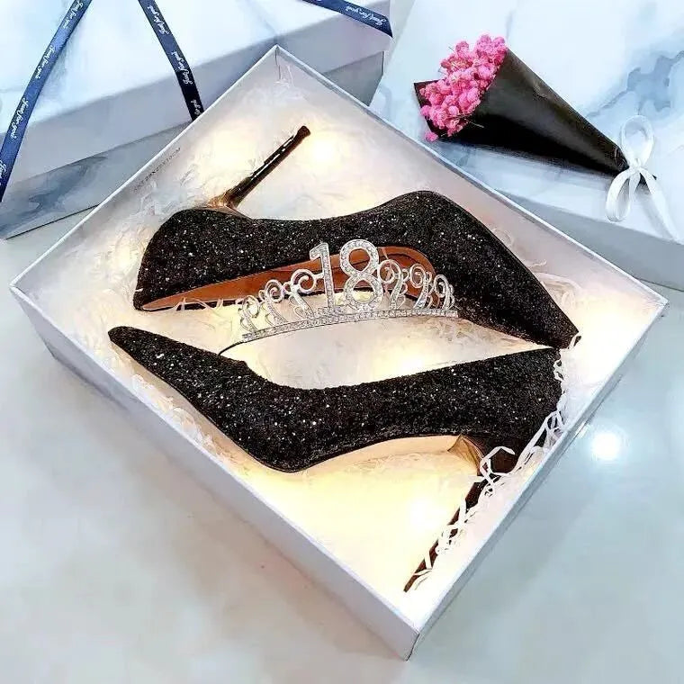 Silver and black women's stiletto wedding shoes with crystal detail on PU leather upper.