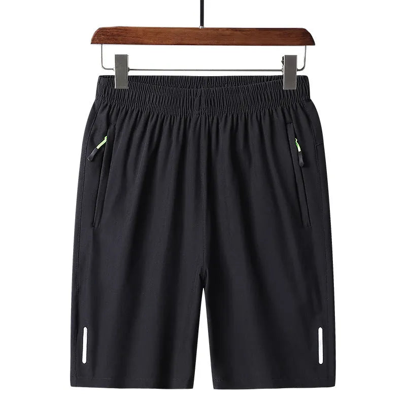Men's polyester solid colour beach casual sports shorts with zippered pocket in black, gray, and blue