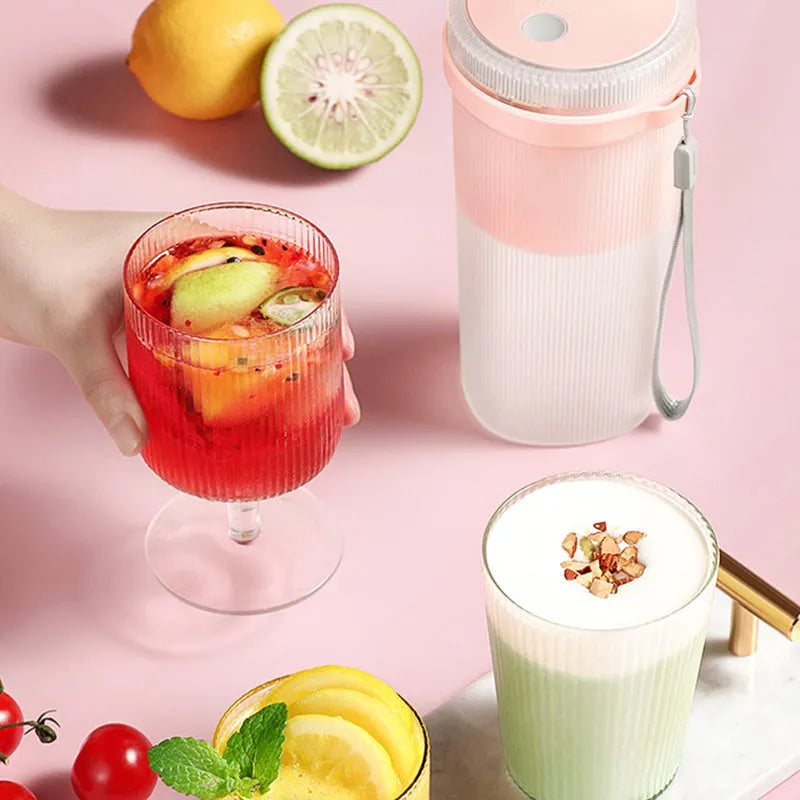 Blue portable blender cup with USB charging cable and stainless steel blending blades