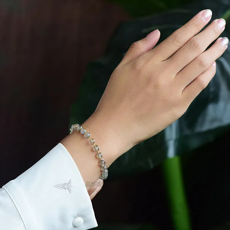 Women's bracelet with 6mm blue moonstone beads and 14K gold plating
