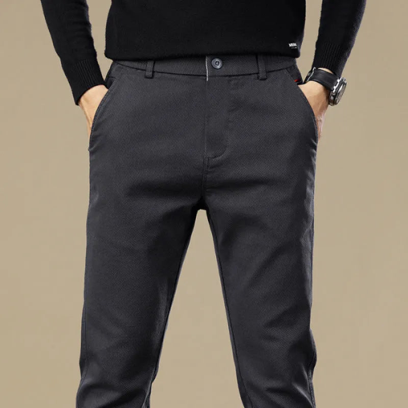 Men's fleece-lined slim fit tapered casual pants in black, cotton fabric, available in sizes 28-40