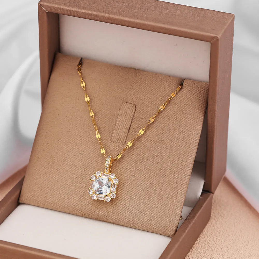 Gold clavicle chain necklace with geometric zircon pendant on titanium steel wave chain