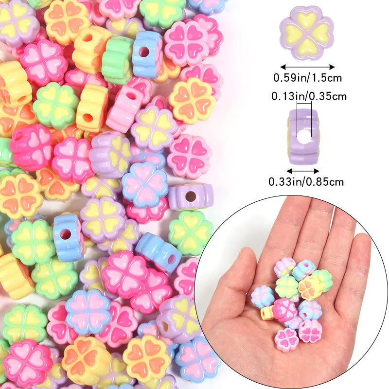 15mm acrylic clover craft beads with frosted finish in multiple colours including pink, blue, yellow, and green