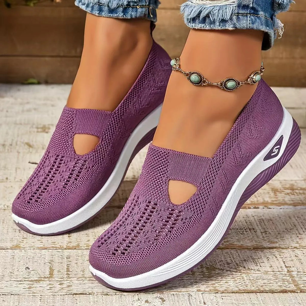 Women's casual flat mesh shoes with T-strap in assorted colours on soft PVC sole