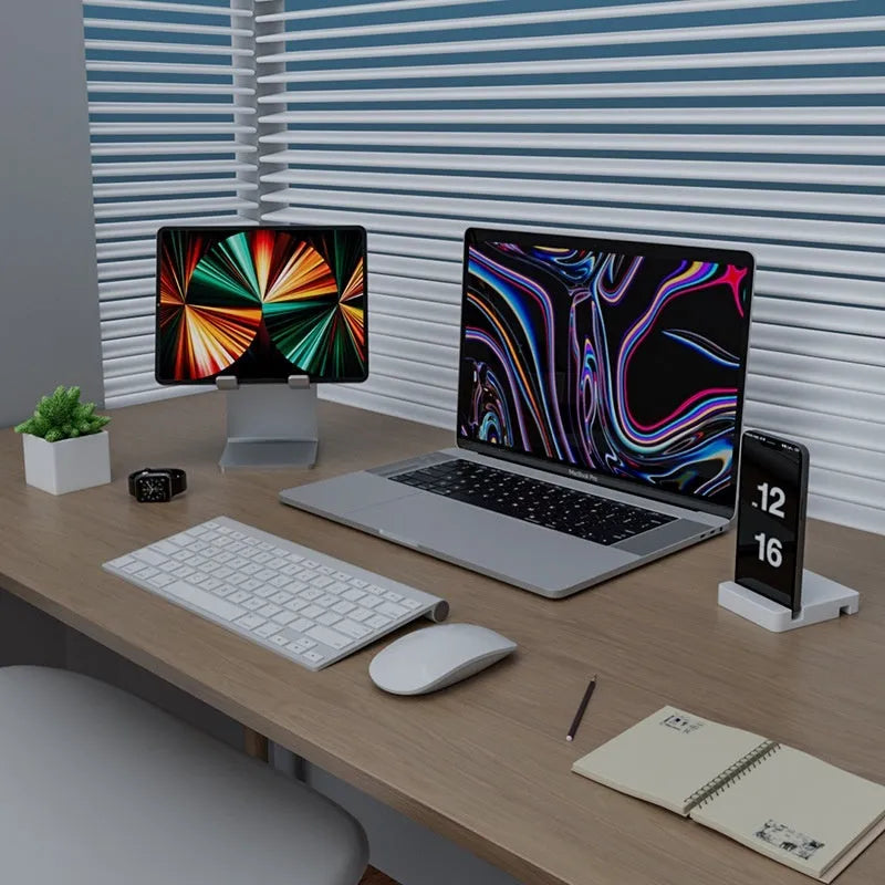 Silver aluminium alloy adjustable desktop stand with phone holder on a desk