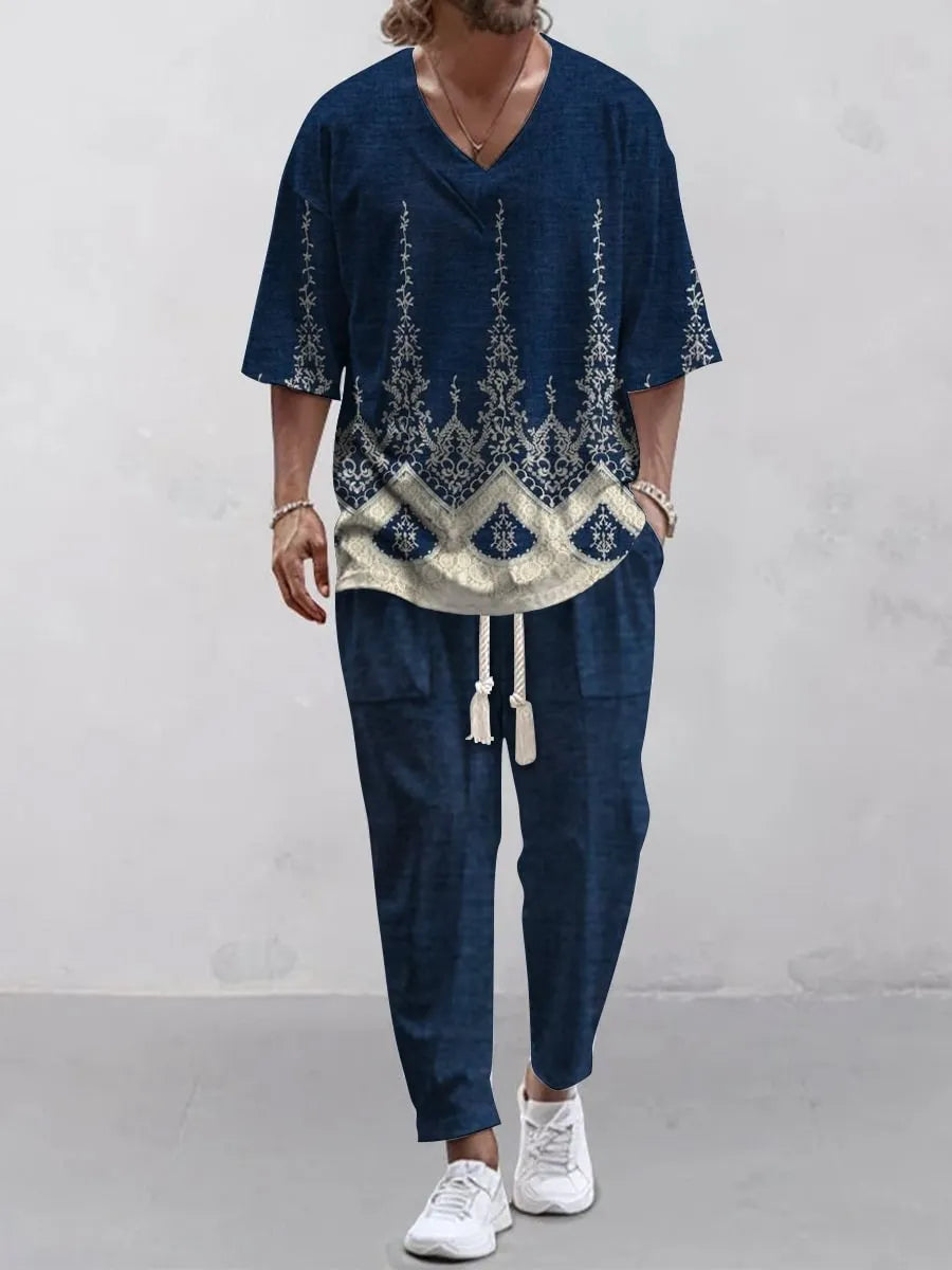 Cropped sleeve V-neck jacket and trousers suit in thin polyester fabric on a hanger.