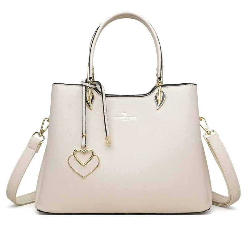 Women's PU leather messenger bag with multiple compartments and adjustable shoulder strap