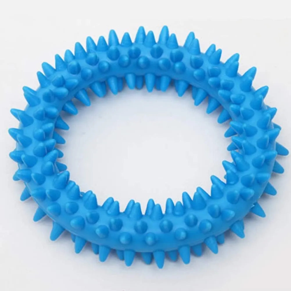 Blue TPR spiky circle ring dog chew toy for dental cleaning on a white background.