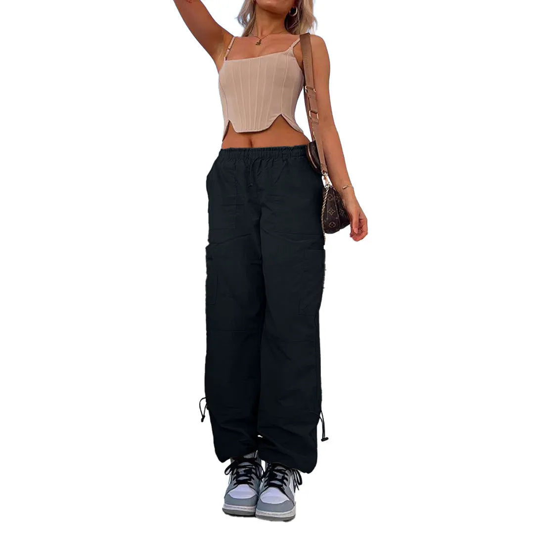 Straight-leg loose fit cargo casual pants in multiple colours on a mannequin, showing utility pockets.