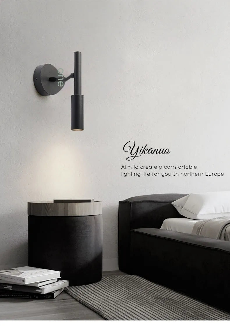 Modern wrought iron wall lamp in black or white with three colour light options