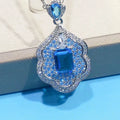 Sea blue geometric copper pendant with aquamarine topaz sky mirror appearance