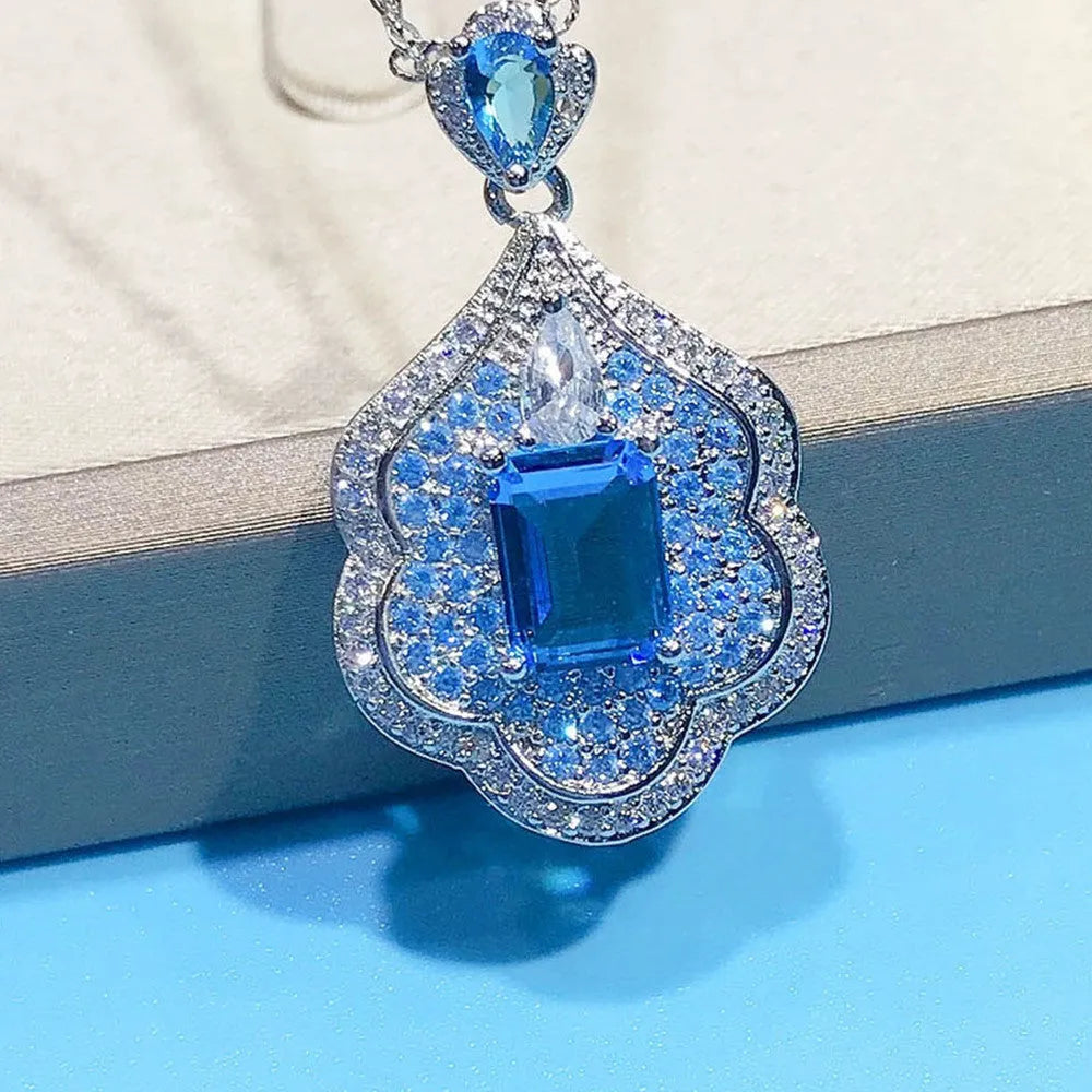 Sea blue geometric copper pendant with aquamarine topaz sky mirror appearance