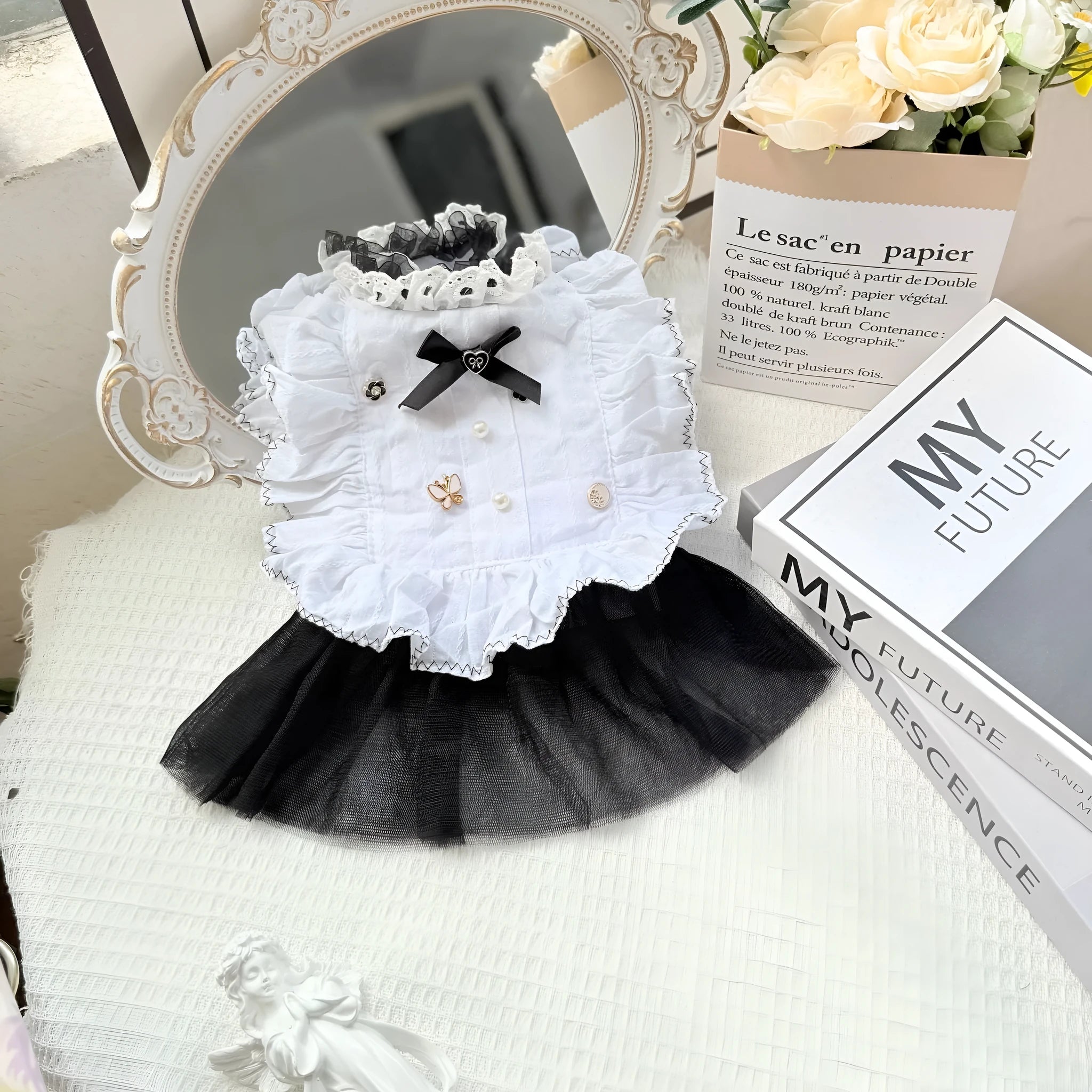 White polyester gauze skirt for small dog on a white background, showing gathered princess-style design.