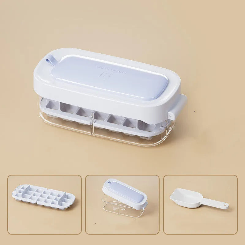 Food-grade high-capacity ice cube tray in blue with integrated storage for an ice shovel.