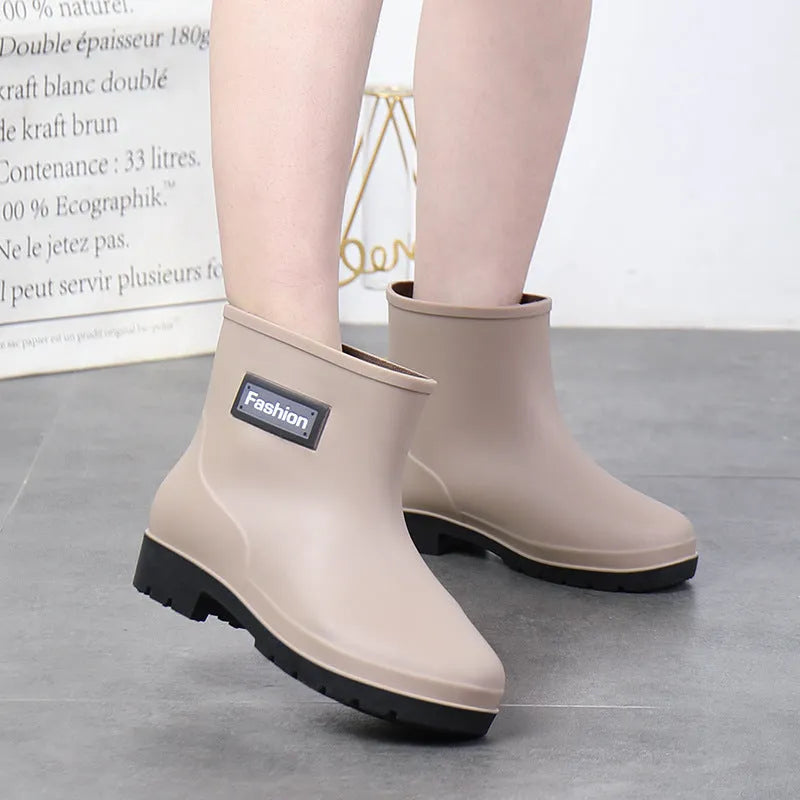 Women's mid-calf rain boots in PVC material with low heel for waterproof work wear