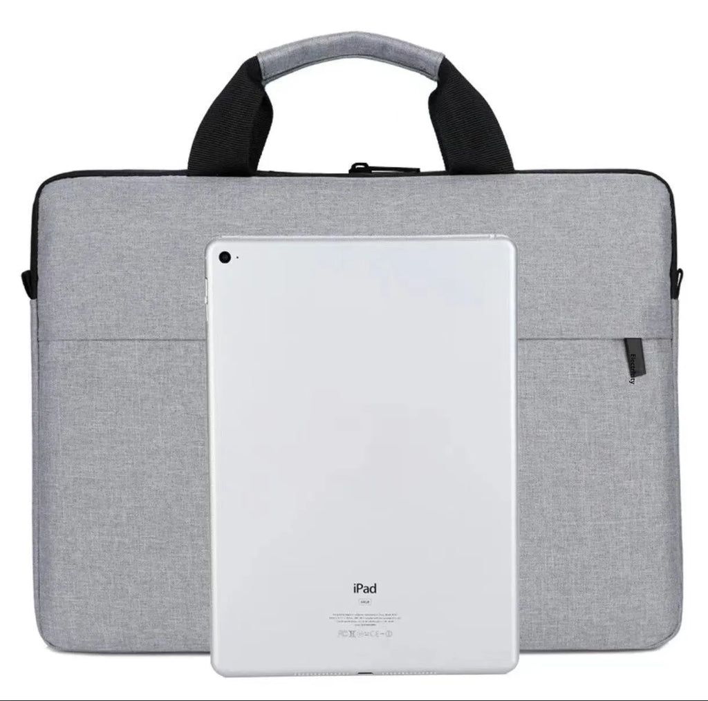 Grey Oxford cloth men's expandable laptop bag with polyester lining and sewing thread detail.