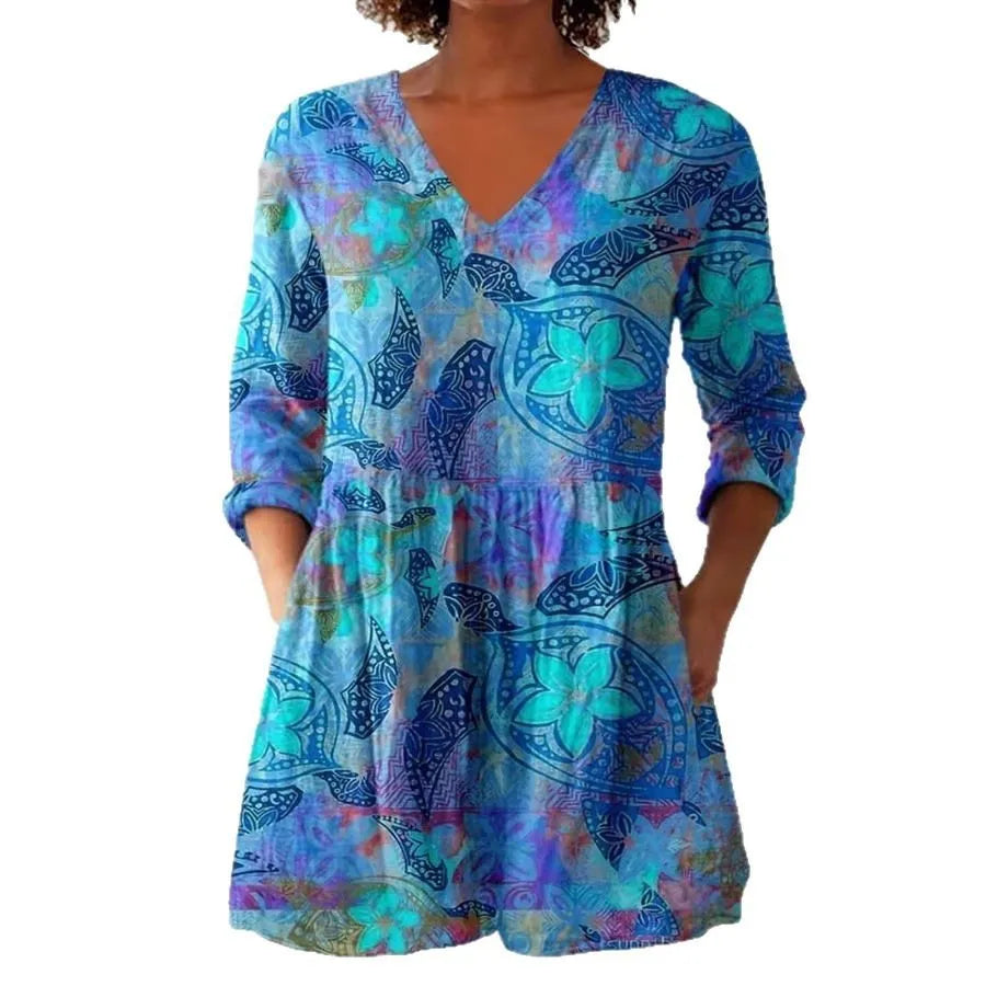 Women's retro-style slim fit long-sleeved top with a colourful digital print pattern.