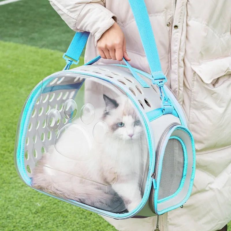 Transparent EVA cat backpack carrier in grass green colour showing space capsule design