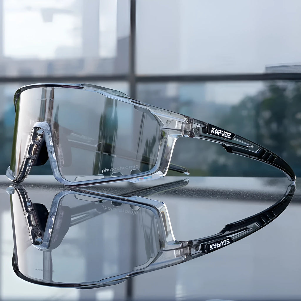 Photochromic cycling sunglasses with semi-rimless TR90 frame on a bicycle helmet.
