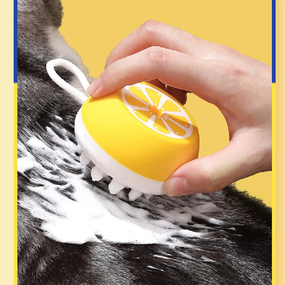 Yellow silicone pet bath brush with comb teeth and massage nodes on a 2-in-1 head.