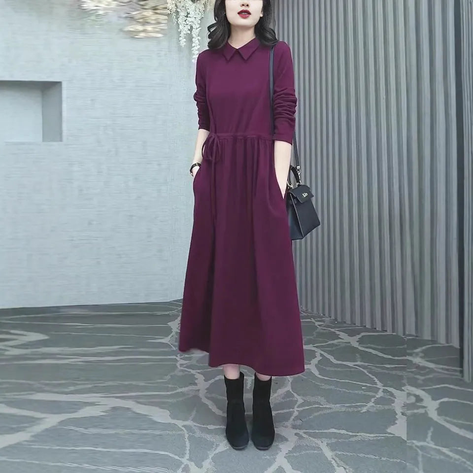 Purplish red plus size long sleeve dress for women, shown as autumn winter office wear.