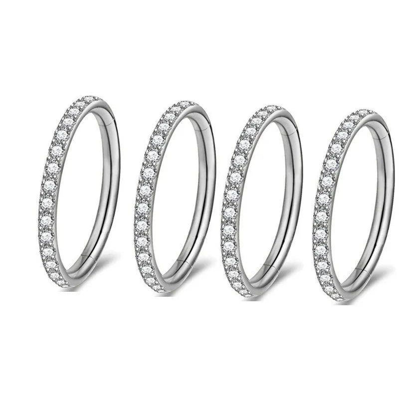 Stainless steel seamless nose ring showing colour options: black, gold, rose gold, and steel.