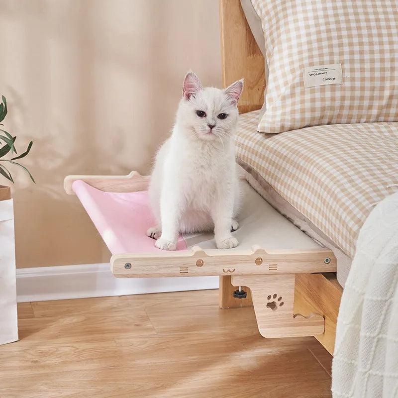 Wooden framed cat hanging hammock bed mounted on a window sill, available in seven style variations.