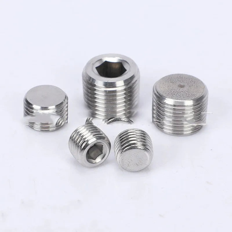 Stainless steel hexagonal pipe plug with 3/8 inch NPT threads for bulkhead fittings.