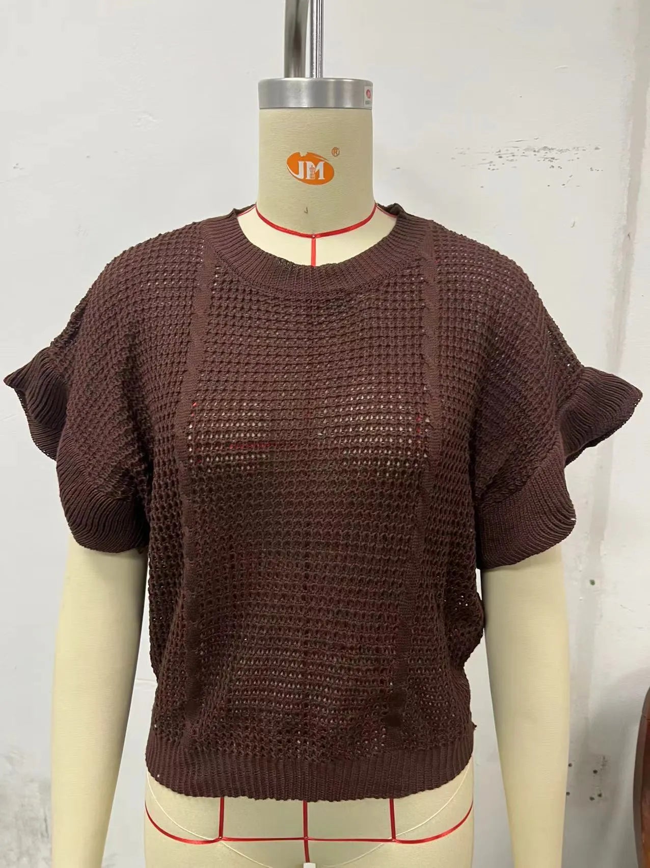 Women's twisted string design knitted pullover sweater with ruffled sleeves in loose fit casual style