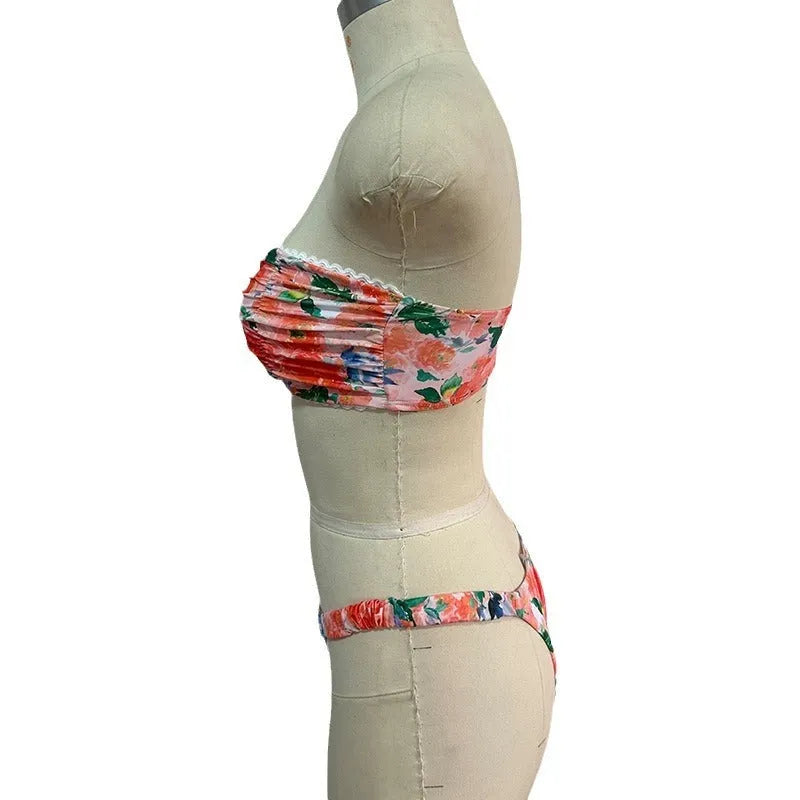 Blue floral print bikini set with lace trim on a sleeveless tube top and matching briefs.