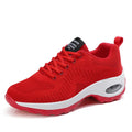 Women's round toe red and black mesh sneakers with front laces on a flat heel and textured PU sole.