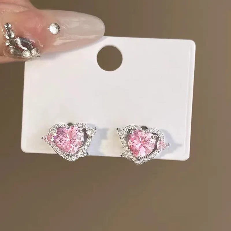 White K colour heart-shaped copper stud earrings for women with electroplated finish