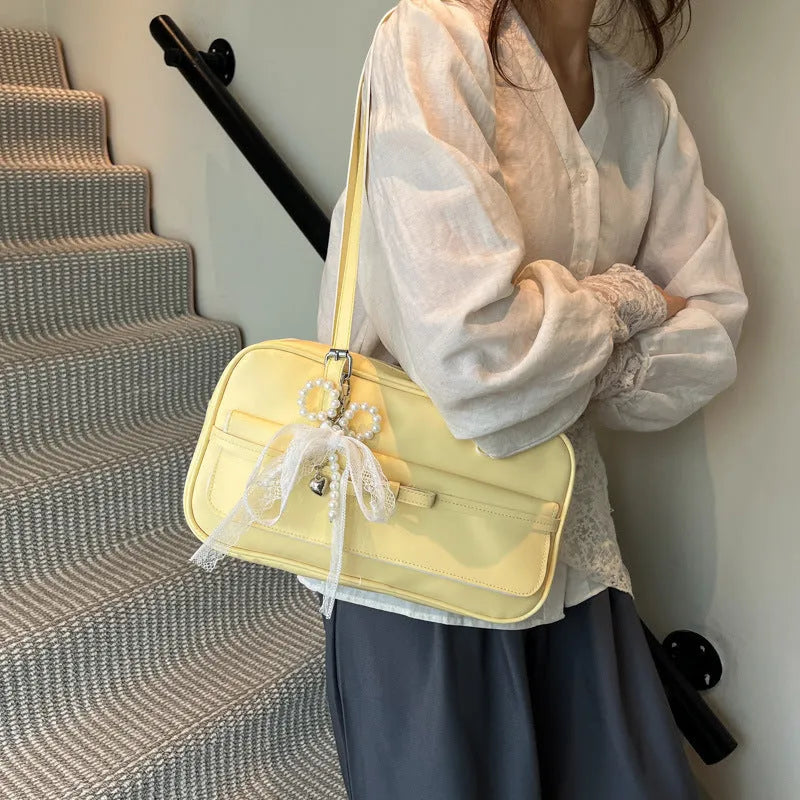 PU single-shoulder flap bag in horizontal square shape with bow stitching decoration