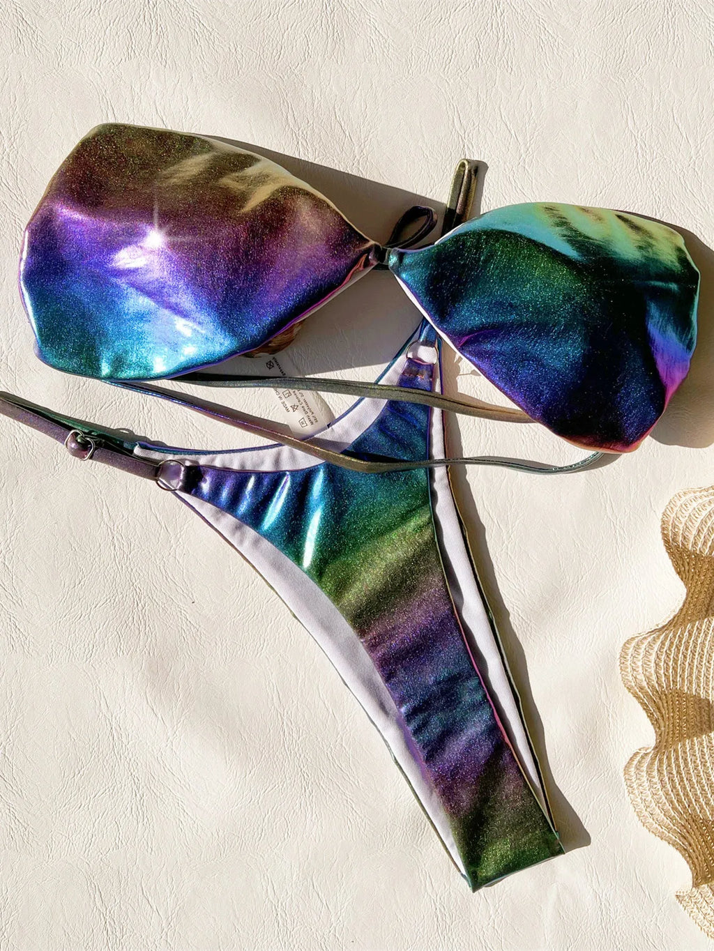 Women's gradient purple bikini swimsuit on a mannequin, showing the two-piece design.
