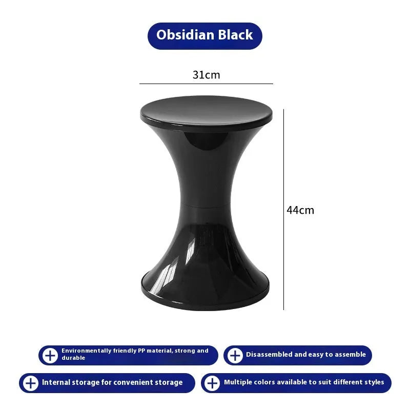 A plastic hourglass-style shoe changing stool in one of five available colours.