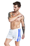 Blue men's lace-up sports shorts with padding on a white background.