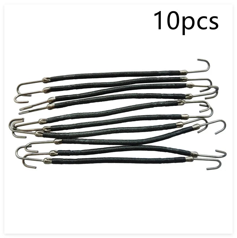 Close-up of a black double hook hair tool for fastening wigs and hair weaves.