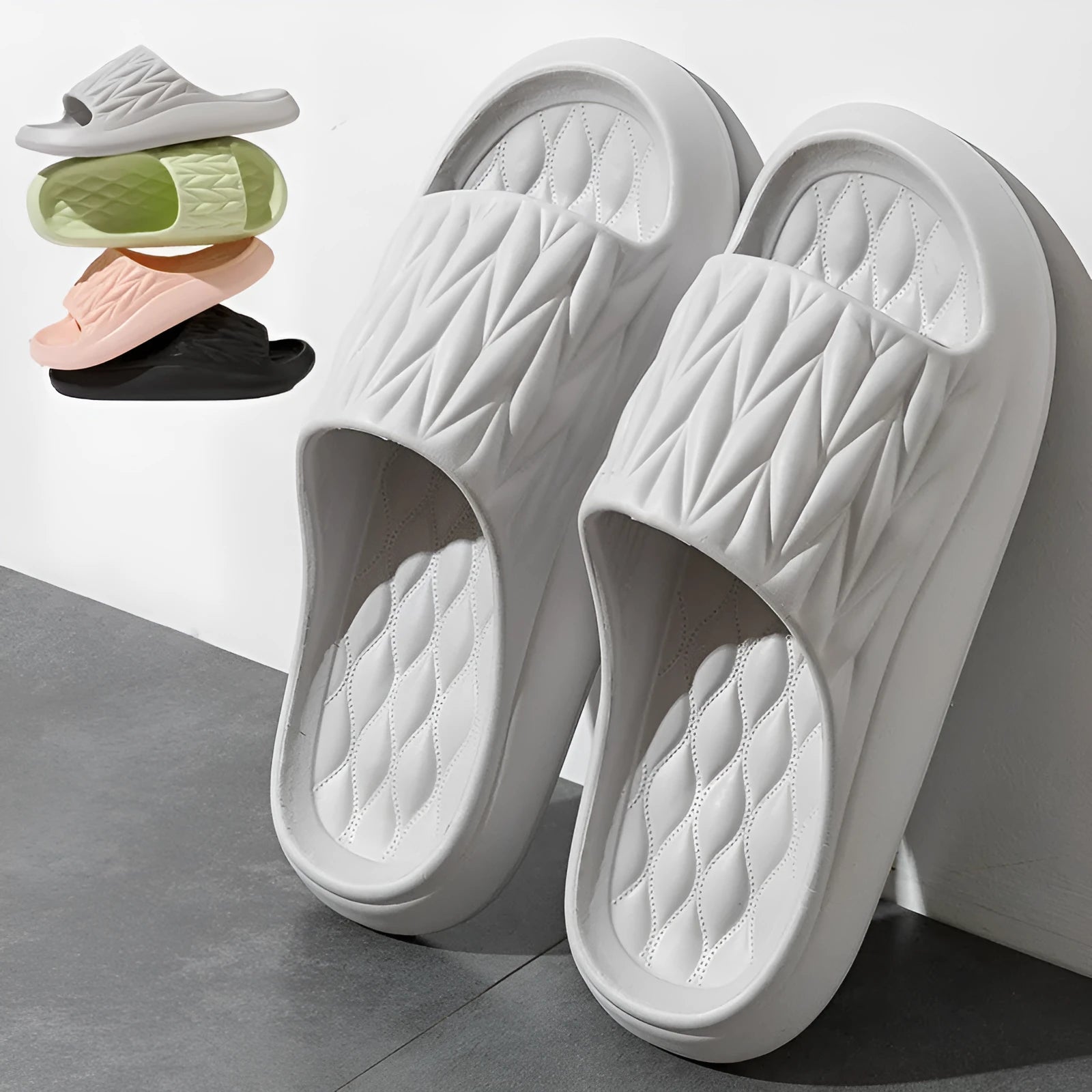 Leaf texture design EVA foam indoor slippers in assorted colours on a white background.