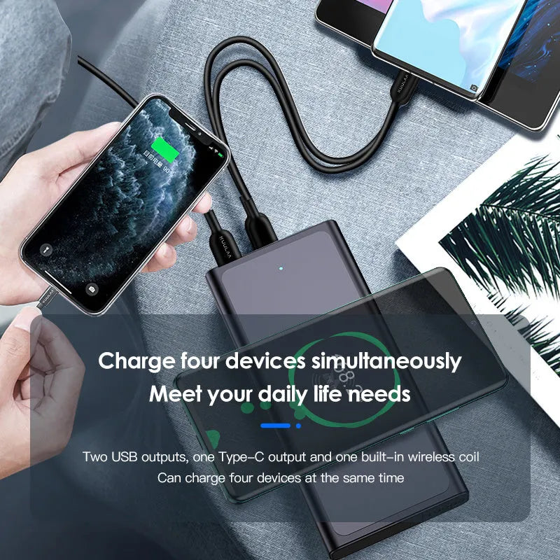Black and blue alloy-shell portable power bank showing wireless charging symbol and 10000mAh capacity label