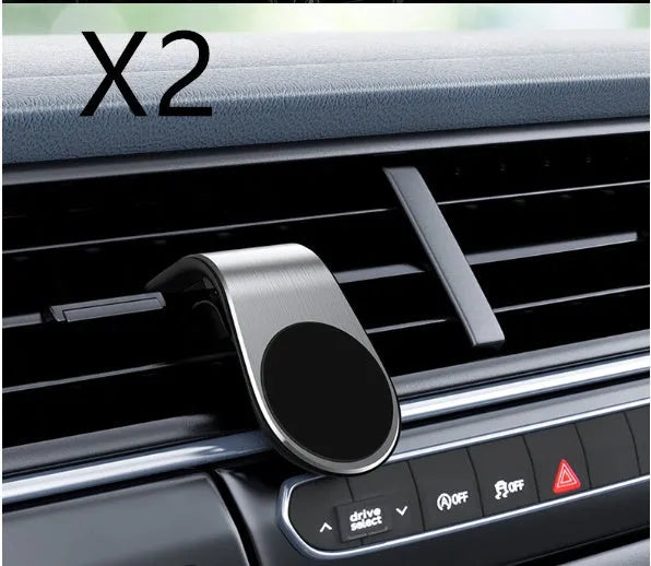 Black car bracket with rotatable ball joint plugged into a vehicle 12V socket