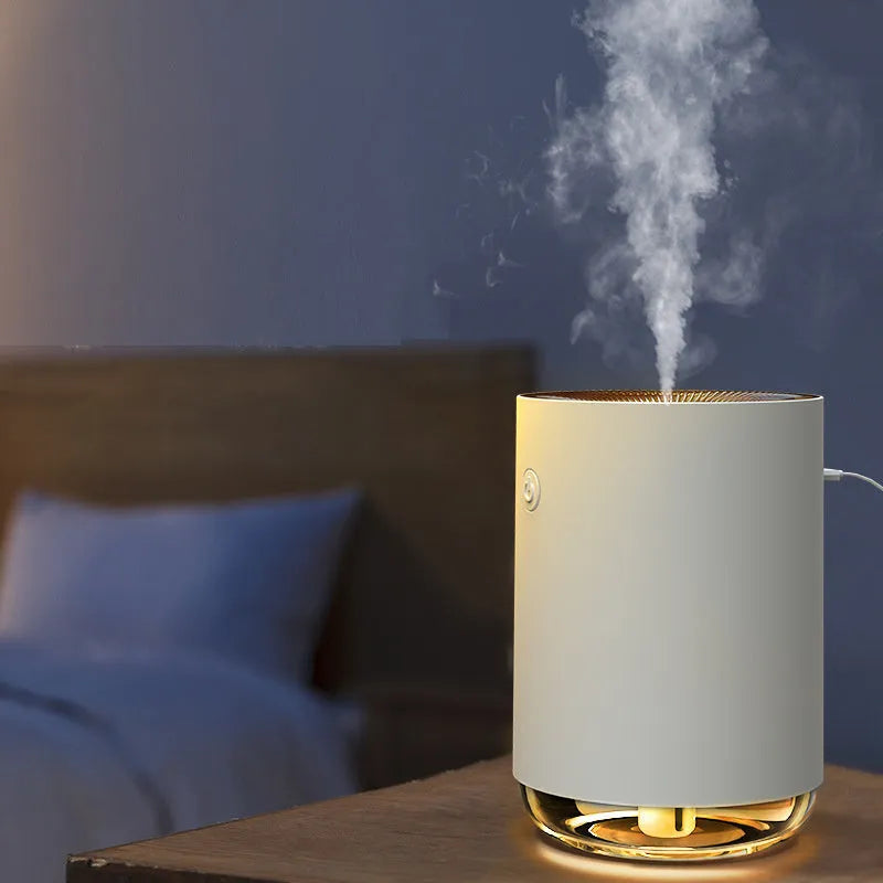 Green USB rechargeable night light humidifier diffuser on table with charging cable