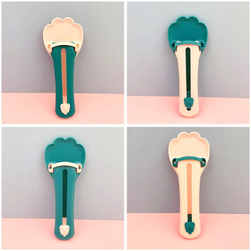 Green and pink pet feed spoon with extrusion design and squeezer feeder function for cat treats and liquid foods