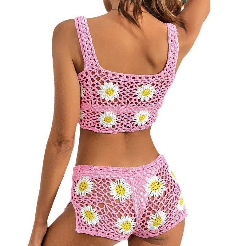 Light green floral patterned bikini swimsuit top and pants on a mannequin.