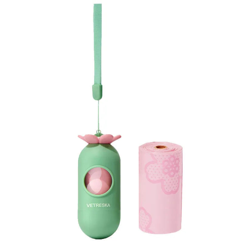 Portable dog poop bag capsule with scented inner bags in strawberry, orange, and cherry blossom styles.